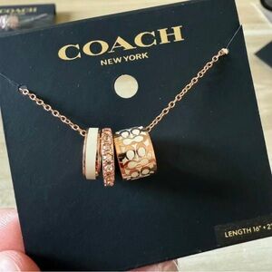 Coach Gold and White Pendant Necklace